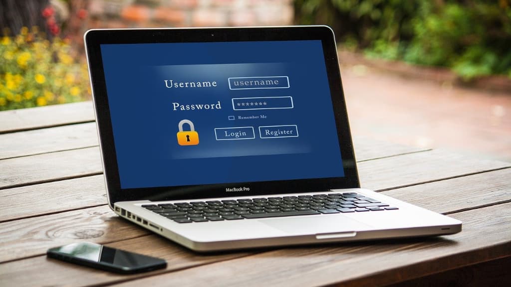 Logging into a website or service on a laptop computer.
