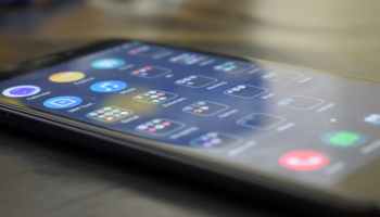 A mobile phone on a table.