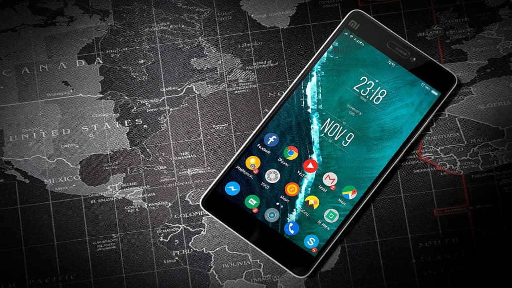 Android phone on a map of the world. Who has access to your Google account data?