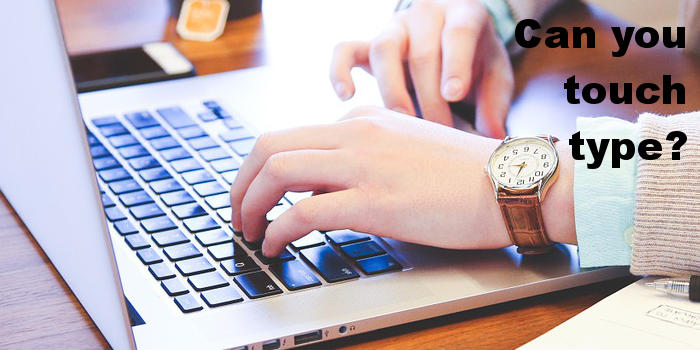Typing on the Apple MacBook, one of the thinnest computers