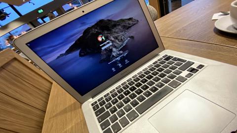 Apple MacBook on a coffee table: Use TextEdit on the Mac for simple documents