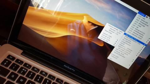 Apple mac showing the desktop and MiniUsage menu bar utility
