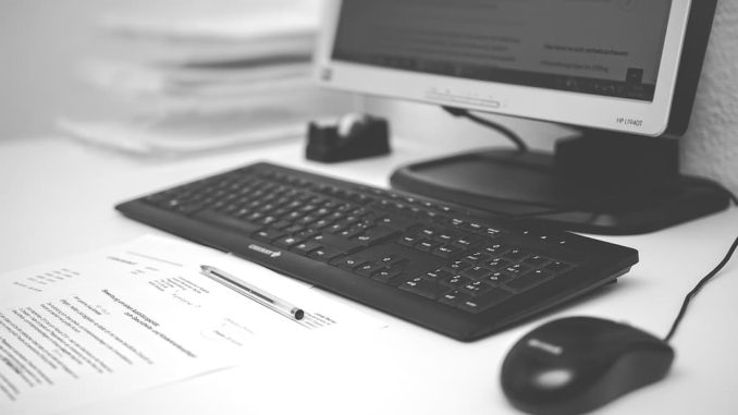 Computer keyboard and monitor. Sync files between computers