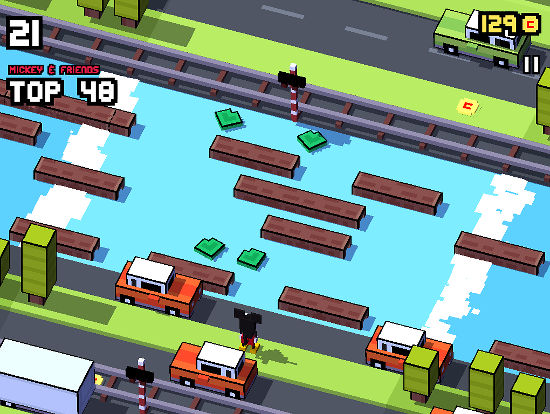 Guide Mickey across the river by stepping on the floating logs and lilly pads in Disney Crossy Road
