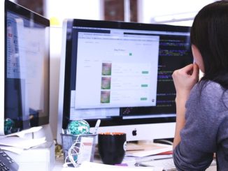 Person using a computer: Design your website with SEO in mind