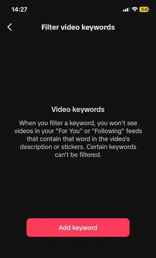 Filter video keywords in TikTok on a phone.